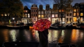 amsterdam-canal-umbrella-night